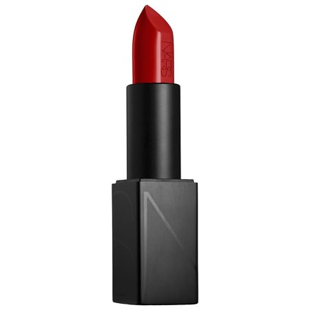 Bold red lipstick in a sleek black tube, featuring the NARS logo embossed on the bullet and a modern, minimalist design.