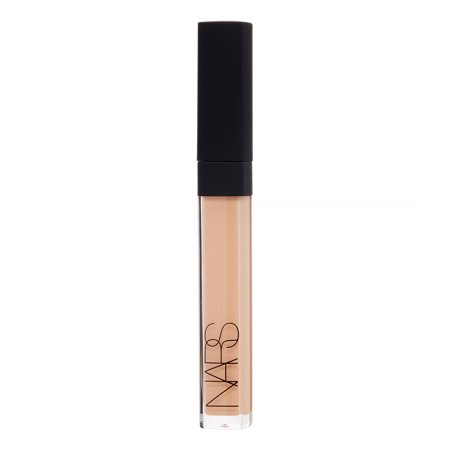 NARS Radiant Creamy Concealer in a sleek black-topped tube with a clear base, alongside NARS Blush Orgasm in a compact featuring a soft pink shade, labeled Cannelle L2.75.