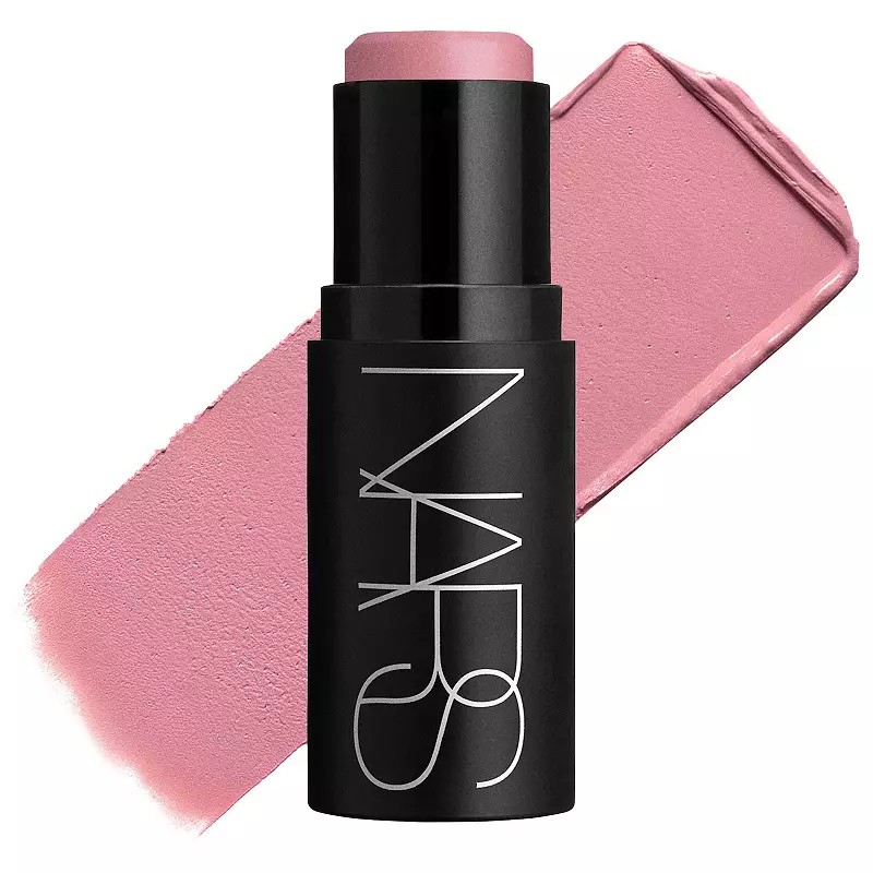 NARS Soft Blur Blush Stick in a sleek black tube with a pink blush swatch beside it, showcasing a creamy texture ideal for cheeks, eyes, and lips.