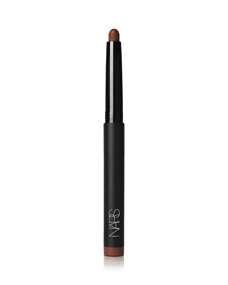 NARS Total Seduction Eyeshadow Stick in "Strip Down," featuring a sleek black casing with a rounded tip, showcasing a warm, nude-brown shade ideal for versatile eye looks.
