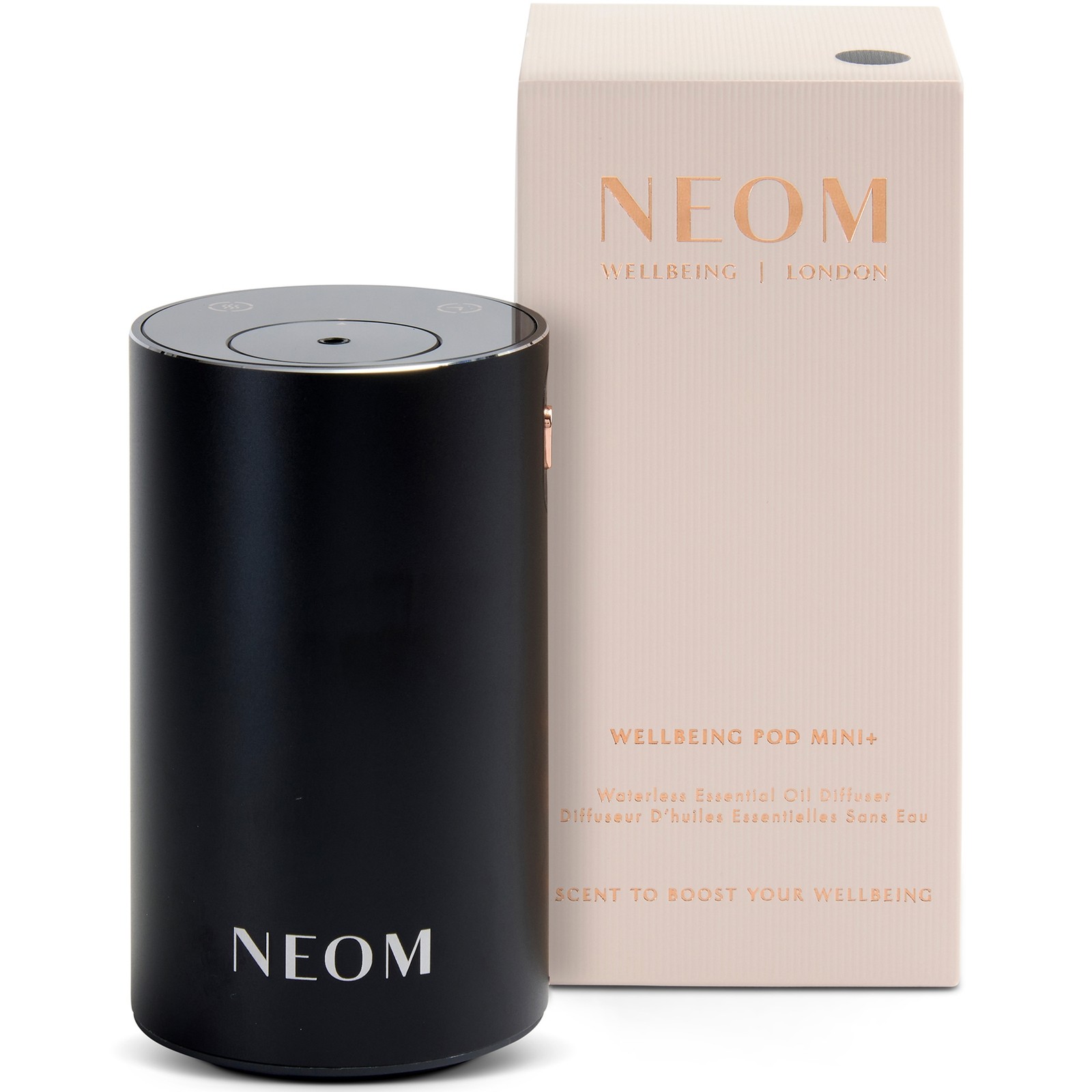 Black cylindrical essential oil diffuser with a sleek matte finish, featuring a control panel on top, accompanied by a beige box labeled "NEOM Wellbeing Pod Mini+" in elegant font.