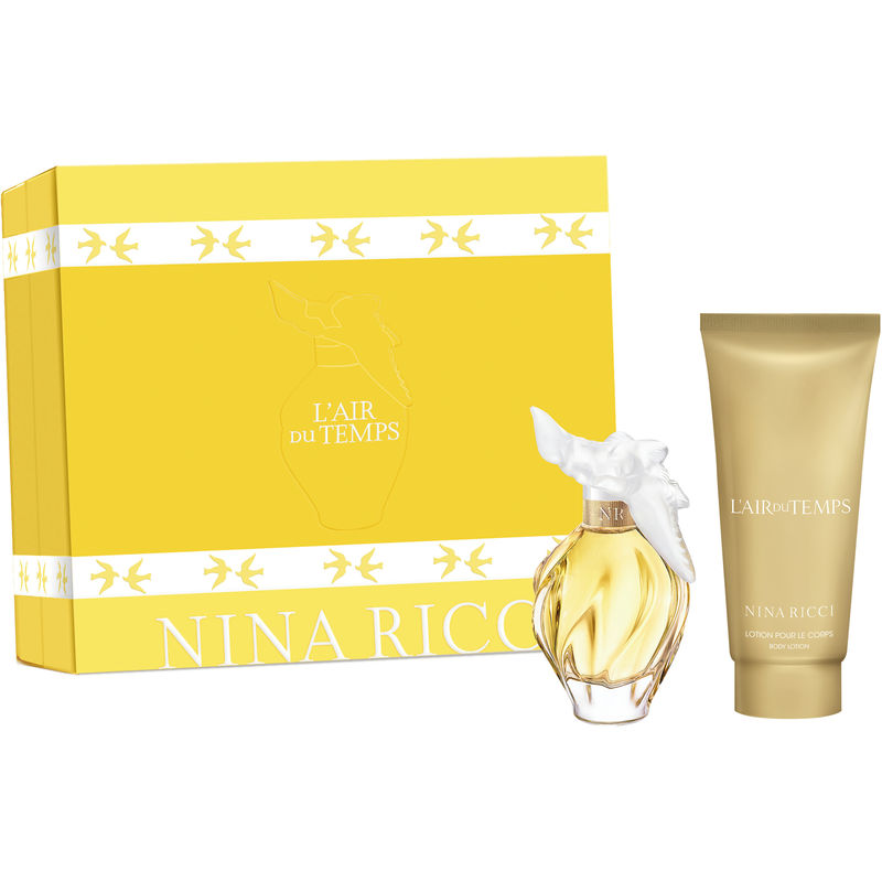 L'air Du Temps gift set featuring a 50ml Eau De Toilette with a floral bottle and a 7ml body lotion, presented in a yellow box adorned with white doves and branding.