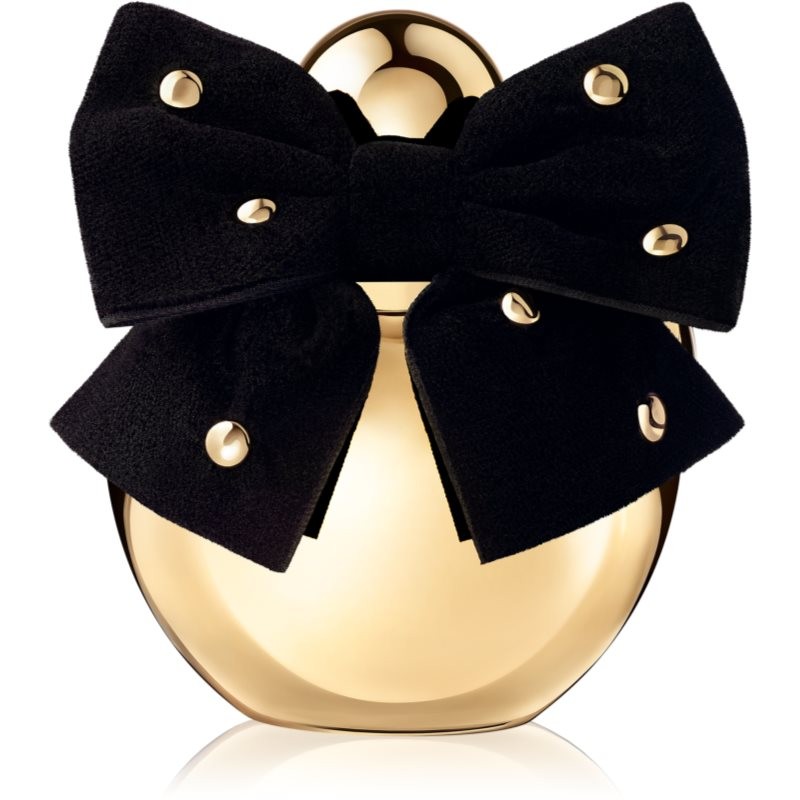 Gold perfume bottle with a rounded shape, adorned with a large black velvet bow featuring gold studs, exuding elegance and luxury.