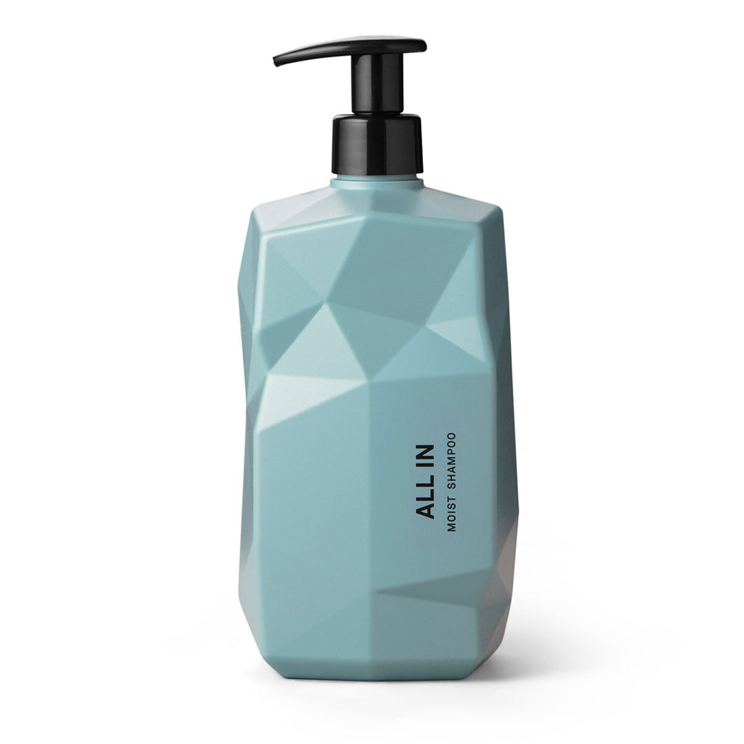 Turquoise geometric-shaped bottle with a black pump, labeled "ALL IN MOIST SHAMPOO," featuring a modern design, suitable for 1000ml of product.