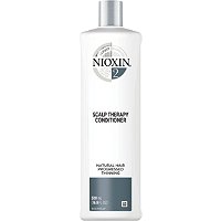 White bottle of Nioxin Scalp Therapy Conditioner, 16.9 oz, featuring a silver cap, labeled for natural hair with progressed thinning, and marked as System 2.