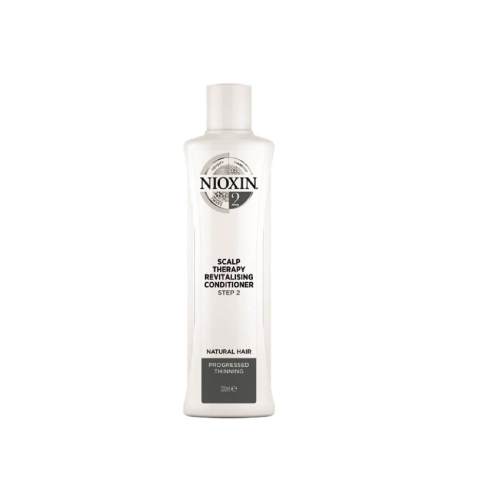 Nioxin Scalp Therapy Step 2 Balsam in a sleek white bottle with a pump top, labeled for natural hair, designed for revitalizing and addressing progressive thinning, 300ML.