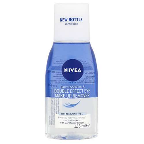 Clear plastic bottle of Nivea Double Effect Eye Make-up Remover, featuring a blue liquid, white cap, and blue label with white text, labeled for all skin types, 125ml size.