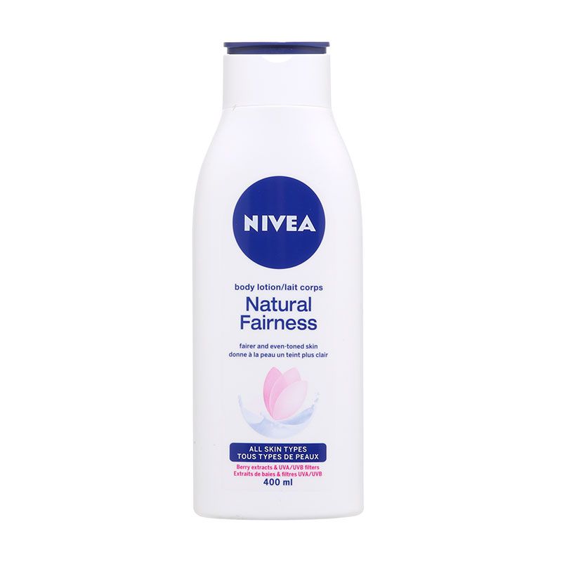 Nivea Body Lotion Natural Fairness in a 400ml white bottle with a blue label, featuring the product name and a description of benefits for all skin types.