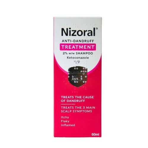 Nizoral Anti-Dandruff Shampoo 60ml in a pink and white box featuring bold text, highlighting treatment for dandruff and scalp symptoms like itchiness and inflammation.