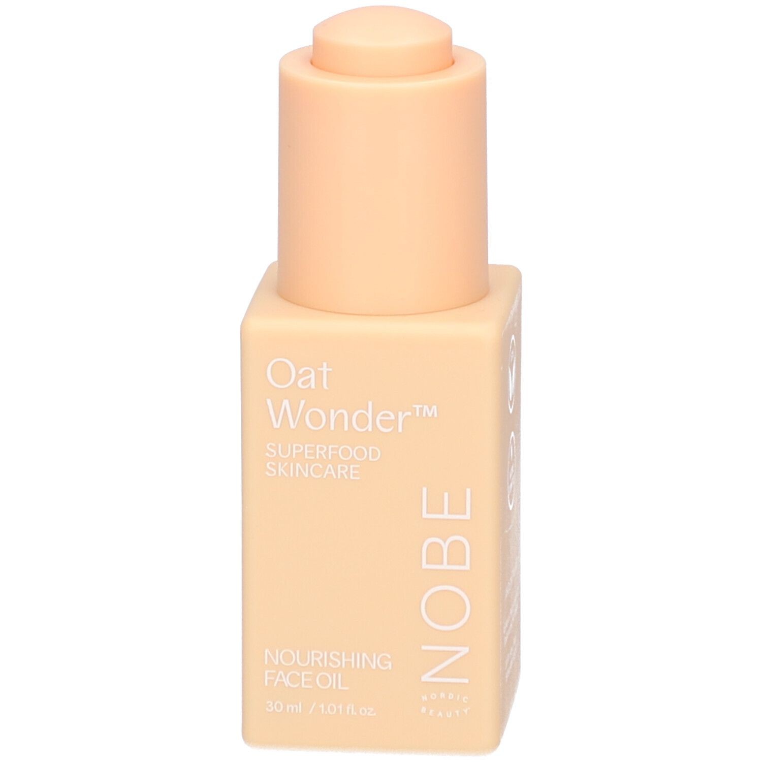 NOBE Oat Wonder Nourishing Face Oil in a 30ml peach-colored bottle with a pump top, featuring minimalist white text and a clean, modern design.