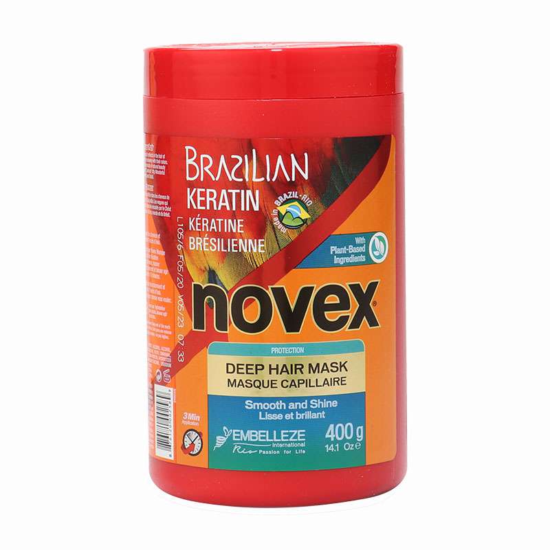 Bright red container of NOVEX Brazilian Keratin Mask, 400 G, featuring a colorful label with the brand name in bold black letters and details about its smoothing and shining properties.