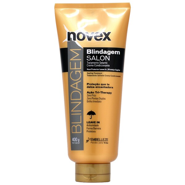 Golden tube of Novex Blindagem Salon Treatment Cream, 400g, featuring a sleek design with black and white text, emphasizing protection and shine for hair.