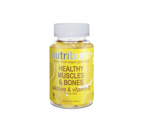 Yellow bottle of Nutriburst Vitamin D3 + K2 gummies, featuring a white cap, with a label highlighting "Healthy Muscles & Bones" and "sugar-free" in bold text.