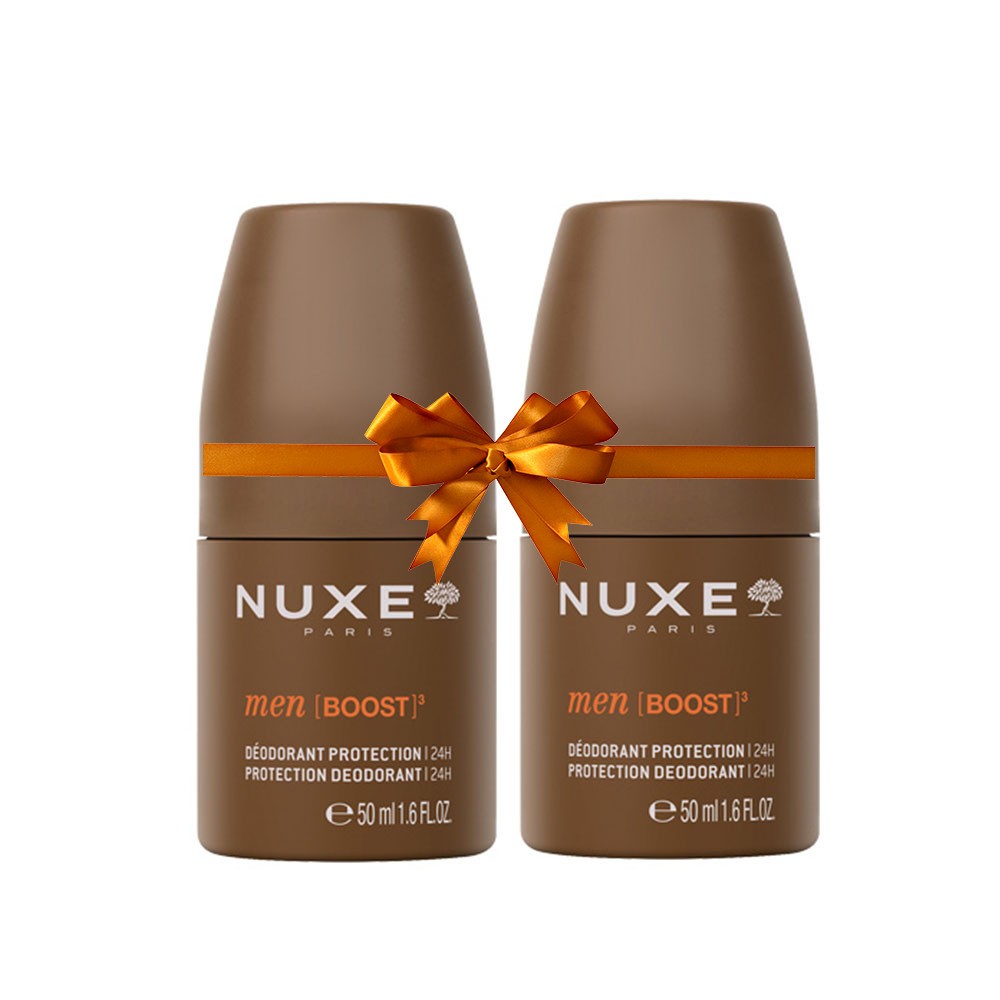 Two brown deodorant roll-on bottles, each 50ml, featuring "NUXE Men Boost" branding, with a decorative orange bow around them, indicating a gift set for 24-hour protection.