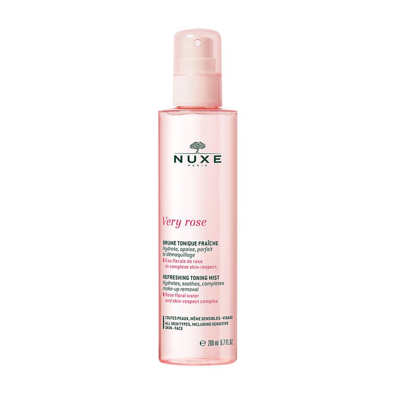 Clear pink bottle with a spray nozzle, labeled "Nuxe Very Rose Refreshing Tonic Lotion," featuring a floral design and text in green and white, 200 ml size for all skin types.