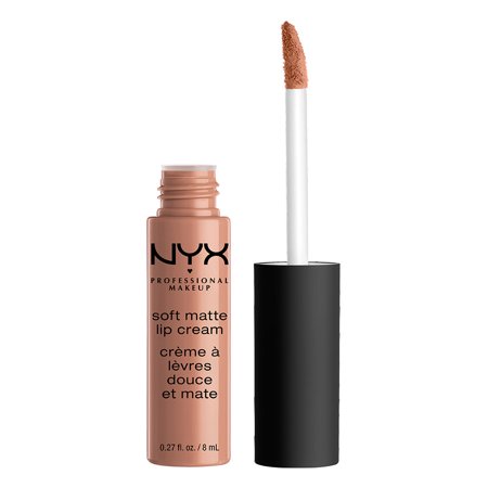 Soft matte lip cream in a nude pink shade, housed in a clear tube with a black cap, featuring a doe-foot applicator for easy application.