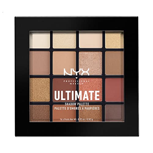 16-pan eyeshadow palette featuring warm neutral shades, including creamy beiges, soft browns, and a rich copper, housed in a sleek black compact with a clear lid.