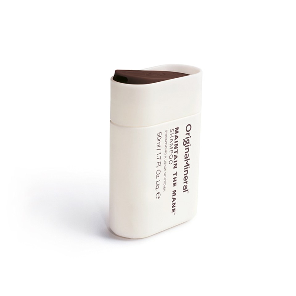 O&M Maintain the Mane Shampoo in a 50ml mini bottle, featuring a sleek white design with a brown flip-top lid and minimalist text on the front.