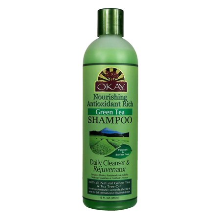 Green bottle of Okay Nourishing Antioxidant Rich Shampoo in Green Tea, 12 oz, featuring a label with bold text, green color scheme, and claims of being paraben and sulfate-free.