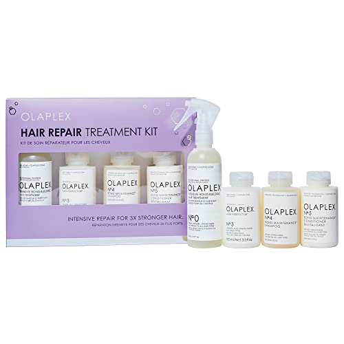 Olaplex Hair Repair Treatment Kit featuring a purple box with white text, includes a spray bottle and four small bottles for hair restructuring, suitable for all hair types.