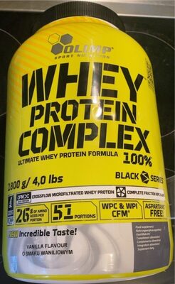 Yellow container of "Whey Protein Complex" by Olimp Nutrition, featuring a black label, 1800g weight, and details on protein content and flavor, with a focus on vanilla.