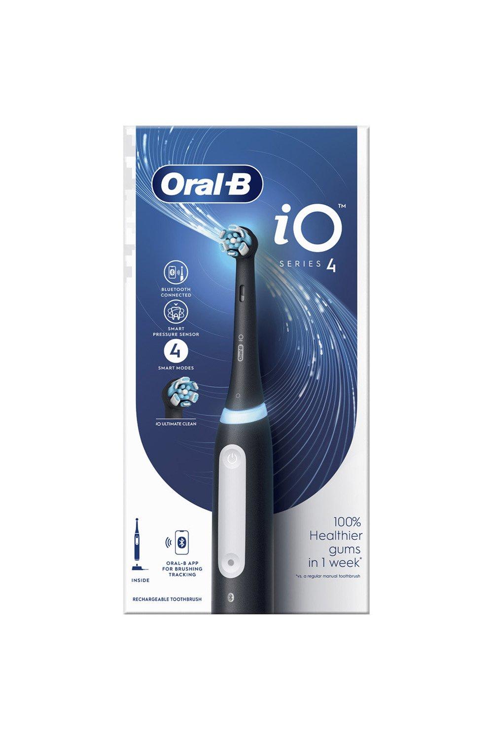 Black Oral-B IO4 electric rechargeable toothbrush with four modes, featuring a sleek design, illuminated control panel, and a white button on the handle, packaged in a colorful box.