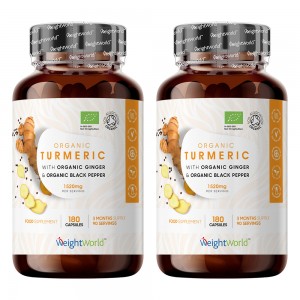 Two bottles of WeightWorld Organic Turmeric & Black Pepper capsules, each containing 180 vegan capsules, with a white and orange label featuring a turmeric root illustration.