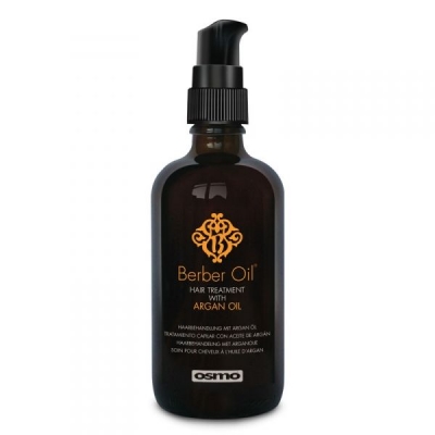 Brown glass bottle with a black pump top, labeled "Berber Oil" in gold lettering, featuring a decorative logo and text indicating it's a hair treatment with argan oil.