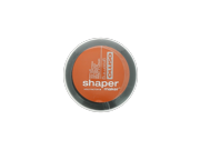 Round, clear container with an orange lid labeled "Shaper Maker 25ml" by Osmo, featuring a minimalist design and a smooth, glossy finish.