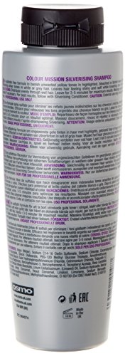 Silver shampoo bottle with a sleek design, featuring a black cap and purple text detailing product information, specifically for color-treated hair care.