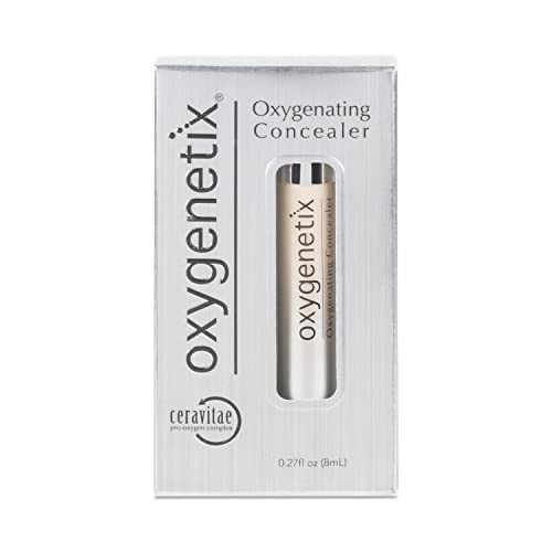 Oxygenetix Oxygenating Concealer in shade N-1.0, packaged in a sleek silver box with a clear window showcasing the 8ml tube inside.
