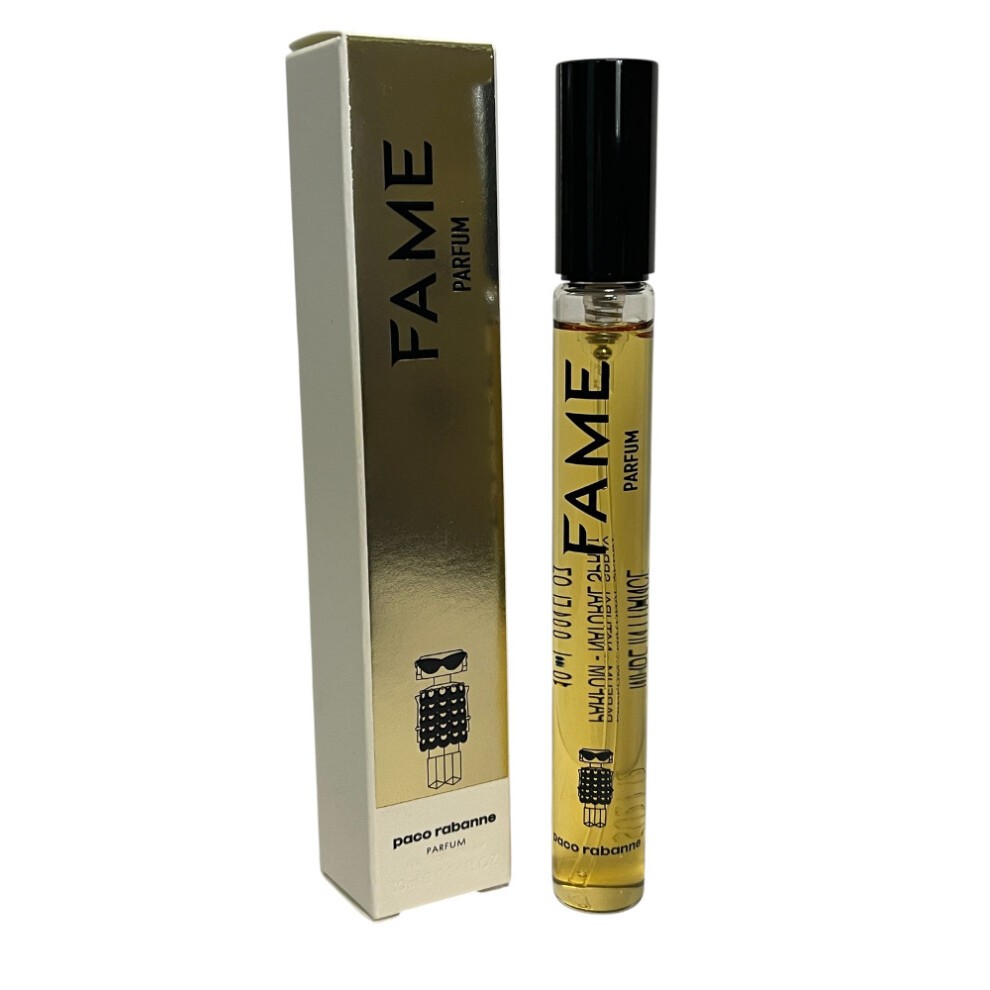 Transparent 10ml spray bottle of Paco Rabanne Fame Eau De Parfum, featuring a gold and black design with a stylish character illustration on the box.