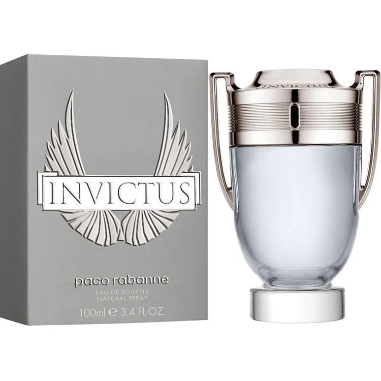 Clear glass bottle shaped like a trophy with silver accents, featuring the word "INVICTUS" in bold on the box, with a sleek design and a sporty aesthetic.