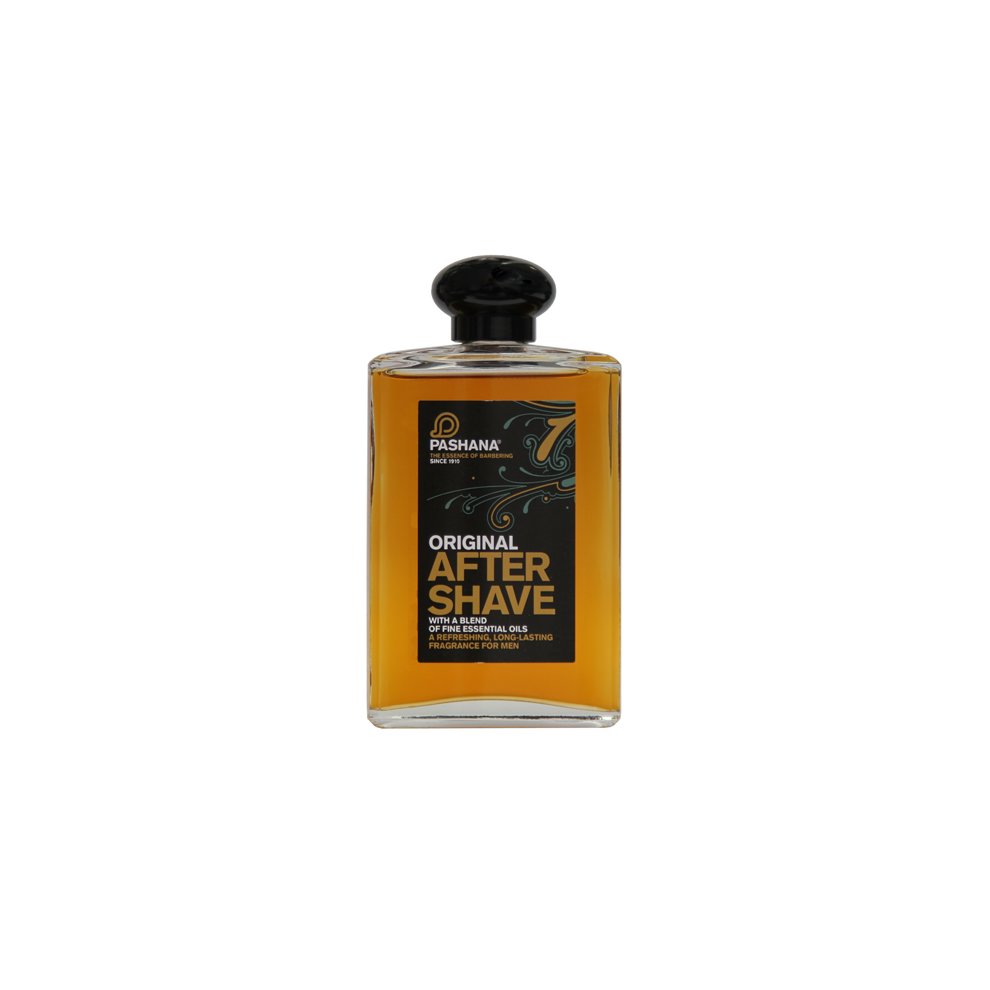Clear glass bottle with a black cap, containing amber-colored aftershave oil, featuring a bold black label with white text that reads "Pashana Original After Shave."