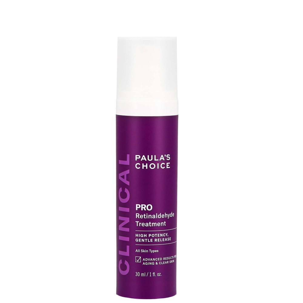 Purple cylindrical bottle with a white pump top, labeled "Paula's Choice Clinical Pro Retinaldehyde Treatment," featuring bold text and a 30ml capacity, designed for skincare.