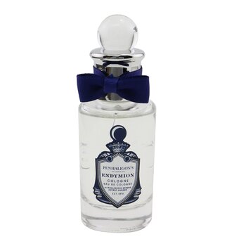 Clear glass bottle of Penhaligon's Endymion cologne, featuring a silver cap, a navy blue bow, and a decorative label with a crest and elegant typography.