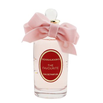 Clear glass bottle of Penhaligon's The Favourite Eau De Parfum, featuring a pink satin bow and a gold cap, with a red label displaying the brand and fragrance name.