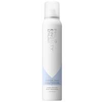 Three white and light blue hair styling products in sleek bottles, featuring minimalist design and clear labels, ideal for achieving various hair styles.