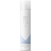 White aerosol canister with a sleek design, featuring a light blue label and the text "Philip Kingsley One More Day Dry Shampoo - 200ml" in elegant font.