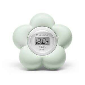 Digital thermometer in a flower shape, featuring a soft green plastic exterior and a clear display showing the temperature at 18.0°C, designed for bathroom and bedroom use.