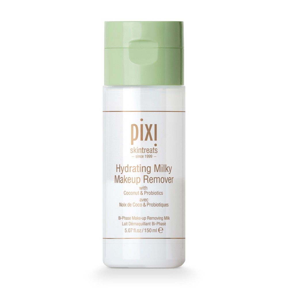 Clear plastic bottle with a light green cap, labeled "Pixi Hydrating Milky Makeup Remover," featuring coconut and probiotics for nourishing makeup removal.