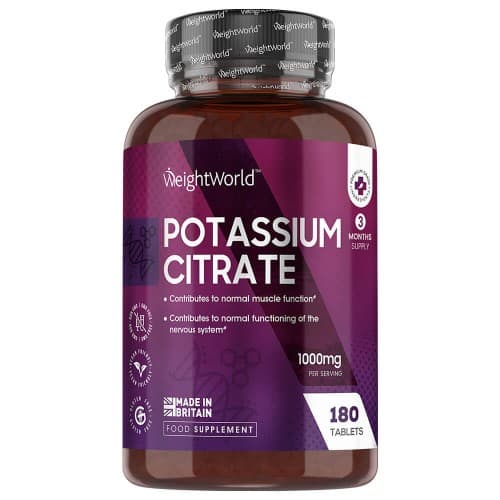 Brown plastic bottle with a purple label, featuring "Potassium Citrate" prominently, lists 1460 mg and 180 tablets, includes icons for muscle function and British-made certification.