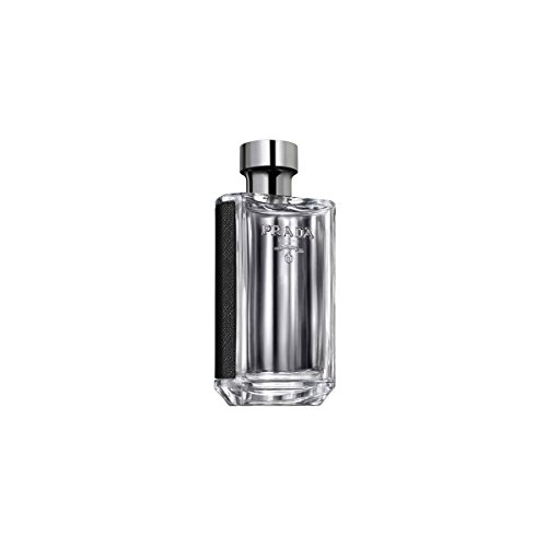 Clear glass bottle with a sleek silver cap, featuring a textured black side panel and embossed "Prada" logo, containing 150 ml of Prada for Men EDT.