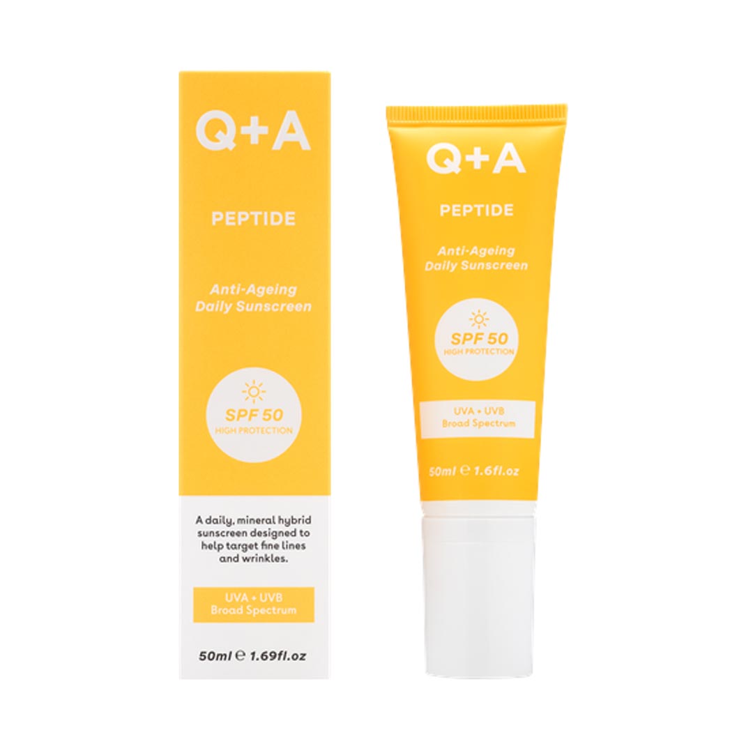 Bright yellow tube of Q+A Peptide Protective Face Cream SPF 50, featuring anti-aging claims, with a white box displaying product details and a 50ml capacity.