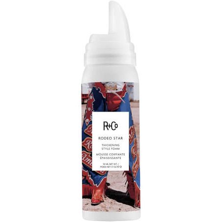 R+Co Rodeo Star Thickening Style Foam in a 50ml white bottle featuring a colorful label with a cowboy-themed design, enriched with Vitamin E and Kiwi Fruit Extract.