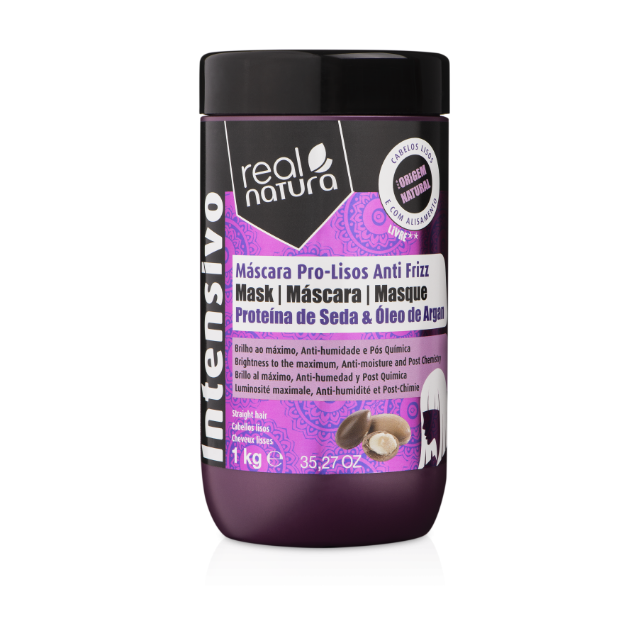 Purple container of Real Natura 1000 G hair mask, labeled "Máscara Pro-Lisos Anti Frizz," featuring ingredients like silk protein and argan oil, with a sleek design and black lid.