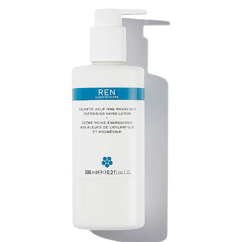White bottle with a pump dispenser, labeled "REN Atlantic Kelp and Magnesium Energising Hand Lotion," featuring blue accents, 300ml size, designed for women.