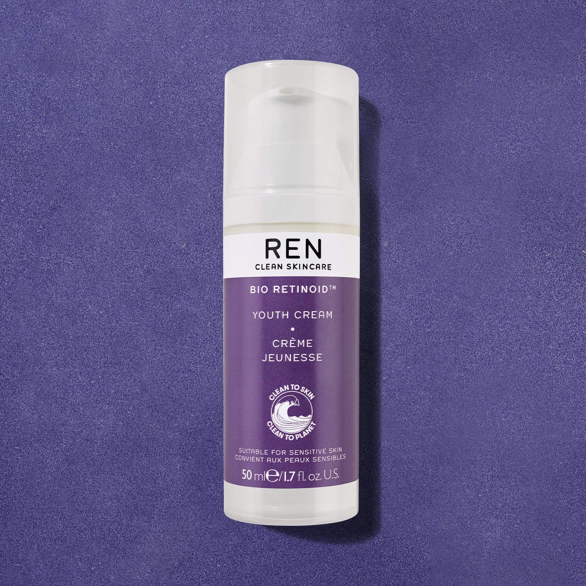 Purple bottle with a white pump dispenser, labeled "REN BIO RETINOID YOUTH CONCENTRATE OIL," 30ml, designed for women, featuring clean skincare branding.
