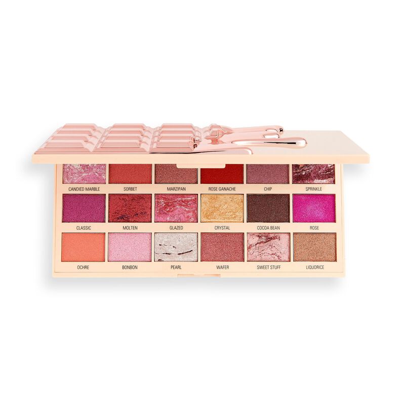 Chocolate eyeshadow palette featuring 18 shades in pink, rose gold, and neutral tones, with a glossy, chocolate bar design and two applicator brushes included.