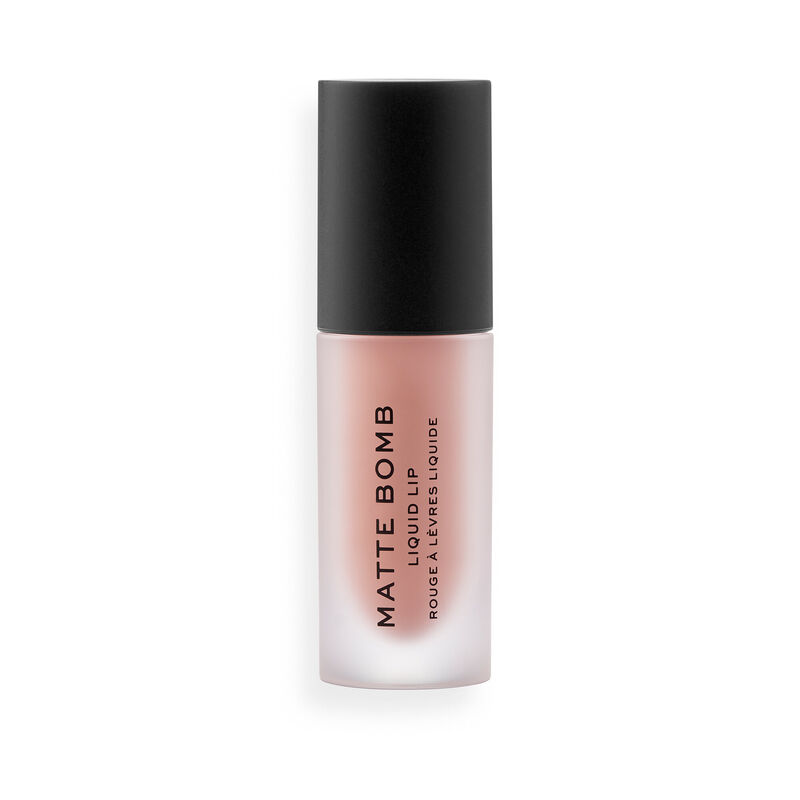 Matte liquid lip color in a sleek, transparent tube with a black cap, labeled "Matte Bomb" and featuring the shade name "Nude Charm."